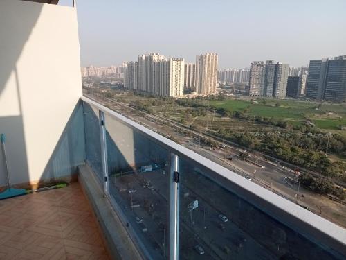 a view from the balcony of a building with a highway at Namoh hotels in Ghaziabad