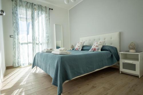 Katil atau katil-katil dalam bilik di Brisa Home Beach