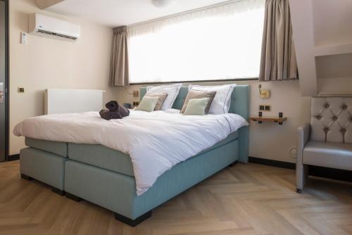 En eller flere senge i et værelse på Unique Luxurious Warm Room New