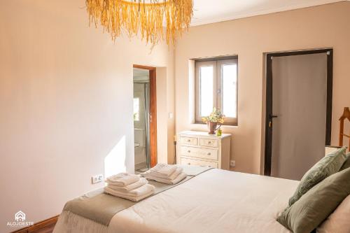 Postel nebo postele na pokoji v ubytování Palmeiras Beach House - Santa Cruz