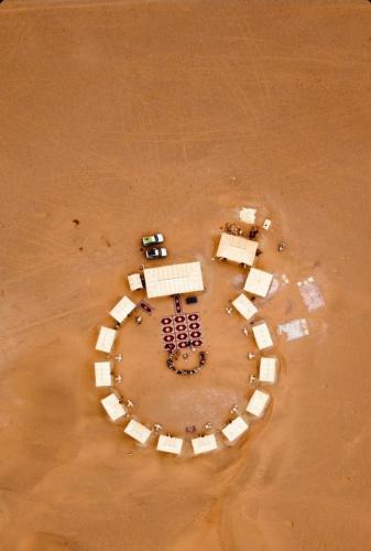 an aerial view of a clock in the desert at Bivouac ZAGORA in Zagora