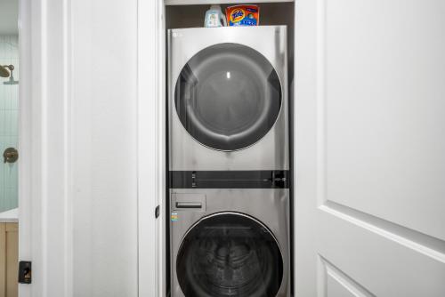 a washer and dryer in a small room at 130 Anderson St A in Sunset Beach