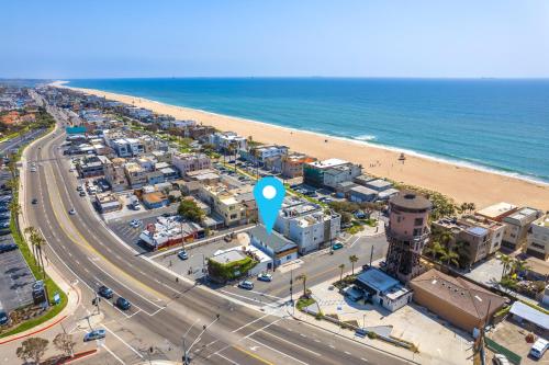 an aerial view of a city and the beach at 130 Anderson St A in Sunset Beach