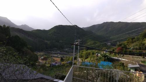 a view of a valley with mountains in the background at J's Select & Lodge - Vacation STAY 16052 in Kumano