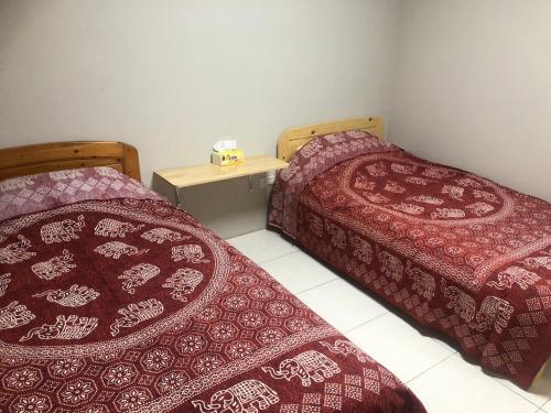 Postel nebo postele na pokoji v ubytování 藏夫私廚的家