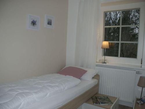 Ένα ή περισσότερα κρεβάτια σε δωμάτιο στο Apartment at the Eichenpark