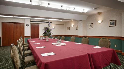 a conference room with a long table and chairs at Best Western Plus Otonabee Inn in Peterborough