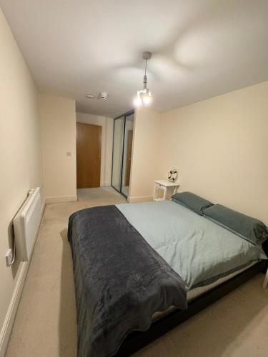 a bedroom with a large bed in a room at Bermondsey by Tower Bridge in London