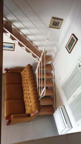 a spiral staircase in a building with at Bingo in Alghero
