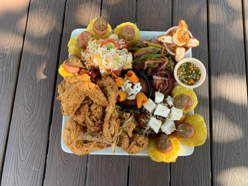a plate of food on a wooden table at ViaVia Leon in León