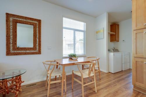 a dining room with a table and chairs and a mirror at Charming Oak View Retreat about 5 Mi to Ojai Valley! in Oak View