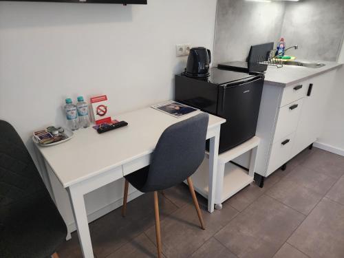 Kuchyň nebo kuchyňský kout v ubytování Davin City Aparments - Self-Check-In