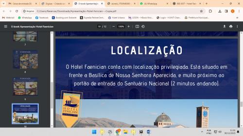 a computer screen with a webpage of a website at Hotel Faenician in Aparecida
