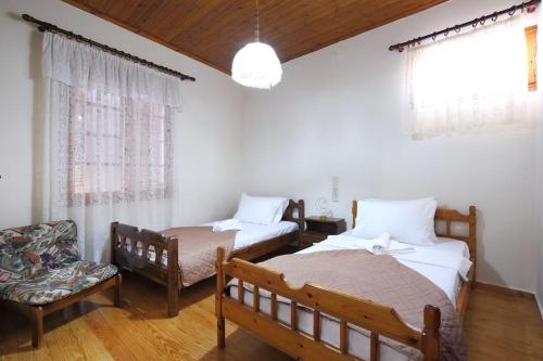 Кровать или кровати в номере Haras House