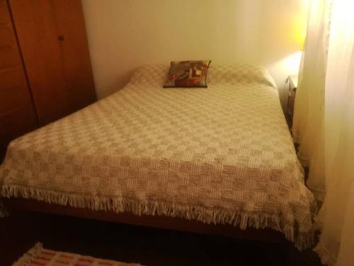 a bed in a small room with at CasitaLibertad 