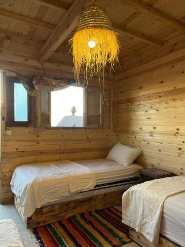 Postel nebo postele na pokoji v ubytování Heaven Surf Camp