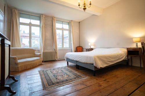 Postel nebo postele na pokoji v ubytování Maison Monsigny ( Annexe Clos Du Bailli )