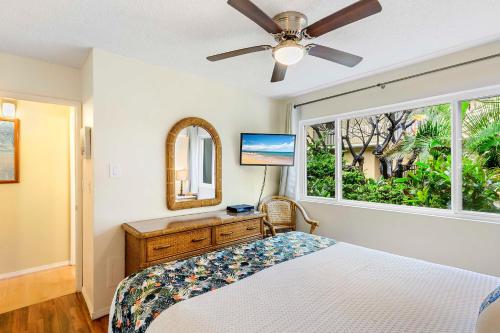 Cama o camas de una habitación en Kihei Kai Oceanfront Condos