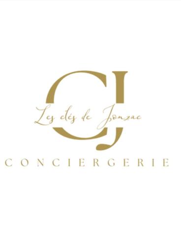 a logo for a company with a letter f and handwriting at Les clés de Jonzac-conciergerie Nid de Douceur in Ozillac