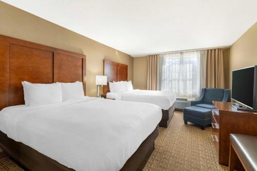 Кровать или кровати в номере Comfort Inn & Suites Dover-Portsmouth
