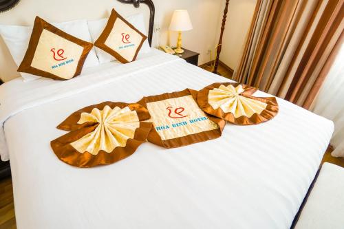 Ένα ή περισσότερα κρεβάτια σε δωμάτιο στο Hoa Binh 1 Hotel
