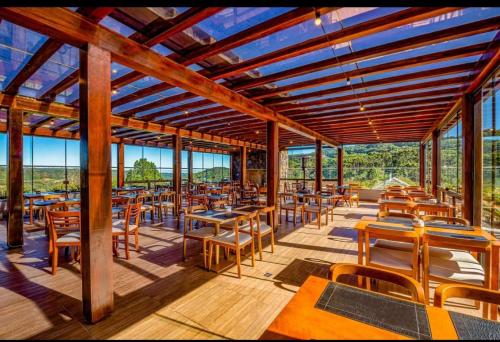 Ресторант или друго място за хранене в Laghetto Resort Golden Gramado