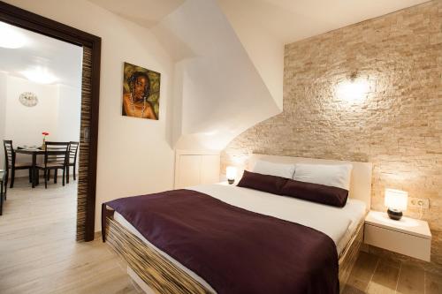 Postel nebo postele na pokoji v ubytování Apartments Villa Bianca