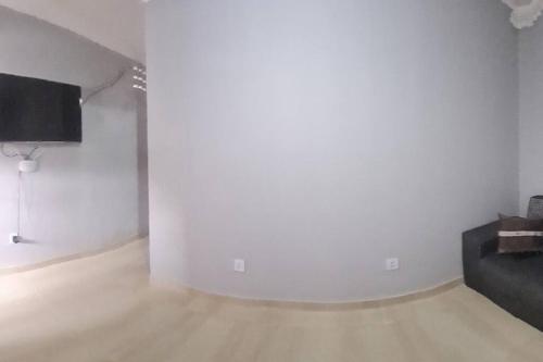 Μια τηλεόραση ή/και κέντρο ψυχαγωγίας στο casa mobiliada para hospedagens por diária e por temporada