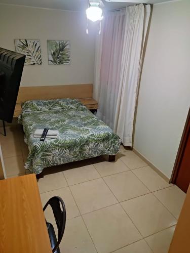 Ένα ή περισσότερα κρεβάτια σε δωμάτιο στο Hotel Kallma Adventures