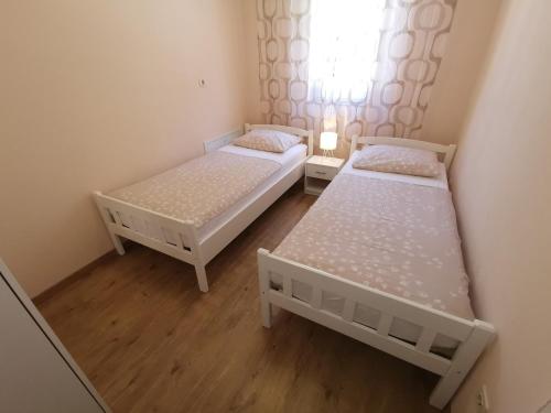 Apartments with parking space Crikvenica - 22514