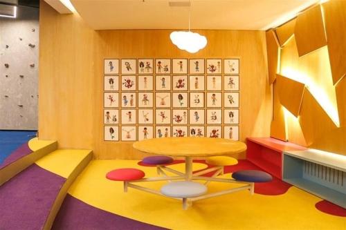 a dining room with a table and chairs and a wall with judgements at Hotel Nacional Rio de Janeiro in Rio de Janeiro