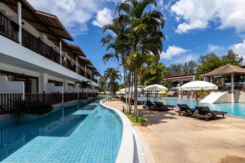 ein Blick auf den Pool im Resort in der Unterkunft Arinara Beach Resort Phuket - SHA Extra Plus in Strand Bang Tao