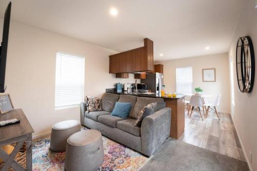 a living room with a couch and a kitchen at 2 Bedroom Coastal Home in SLO in San Luis Obispo