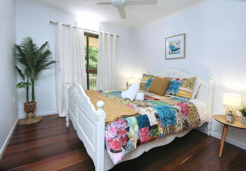Postel nebo postele na pokoji v ubytování 34 Corser Street Burnett Heads