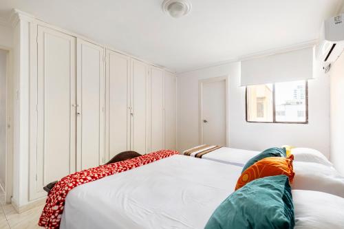 Posteľ alebo postele v izbe v ubytovaní Hermoso Apartamento Riomar