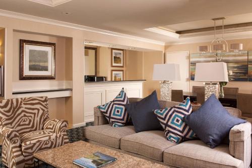 a living room with a couch and two chairs at Greenville Marriott in Greenville