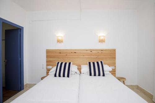 Posteľ alebo postele v izbe v ubytovaní Hotel Casa Mas