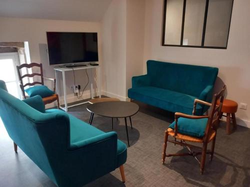 a living room with a couch and chairs and a table at Room in Guest room - Decouvrez un sejour relaxant a Meursault, en France in Meursault