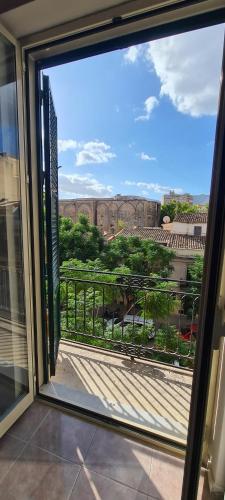 a view from a window of a balcony at I Sollazzi in Palermo