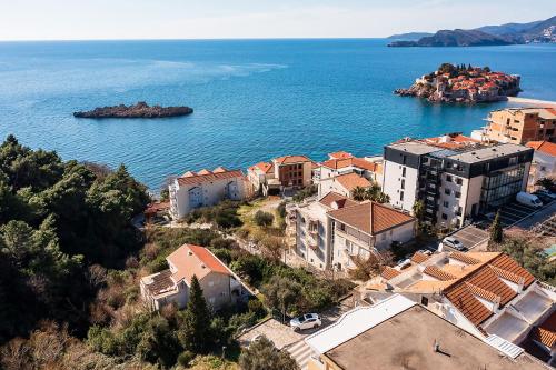 an aerial view of a town on the water at Villa Vanty in Sveti Stefan