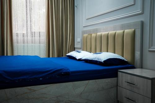 Postel nebo postele na pokoji v ubytování Learmara Apartment #1