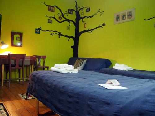 Postel nebo postele na pokoji v ubytování Guest Accommodation Etno Konak Tašana