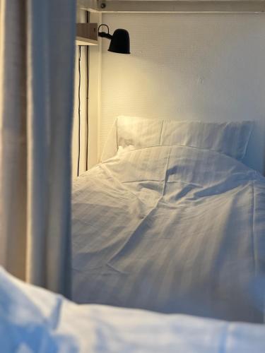 Postel nebo postele na pokoji v ubytování STF Sälen Torgåsgården