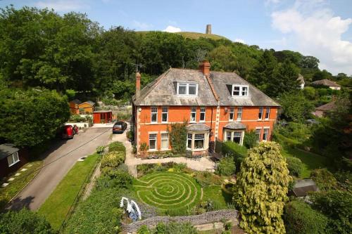 an aerial view of a house with a garden at Phoenix Rise Retreat in Glastonbury