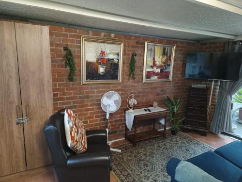 Et opholdsområde på Urban Oasis Cape Town