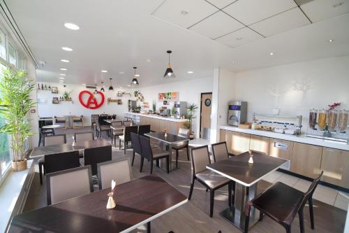 Restaurant ou autre lieu de restauration dans l'établissement Holiday Inn Express Strasbourg - Sud by IHG