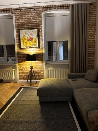 Un lugar para sentarse en SevenEleven Apartments