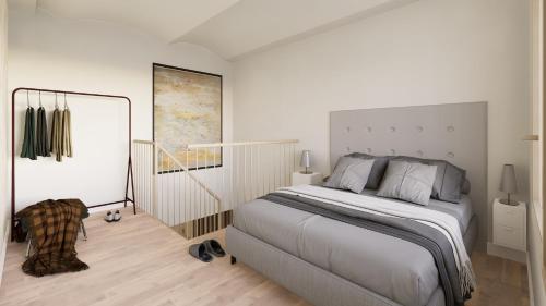 a white bedroom with a large bed in it at Style Madrid Center Santiago Bernabeu in Madrid