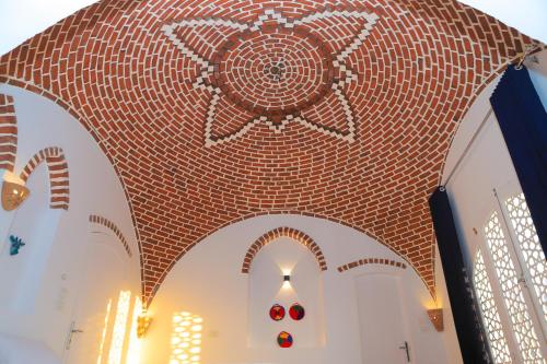 a church with a spider painted on the front of it at El Hanna Valley View in Luxor