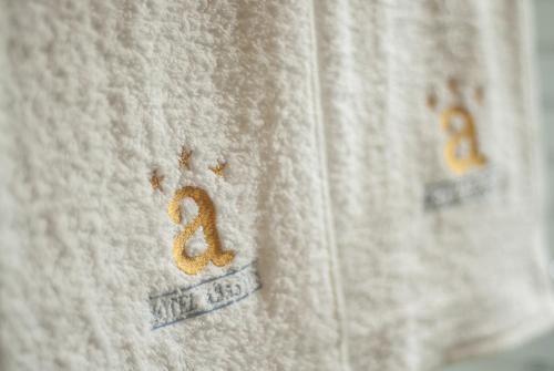 a towel with the number two on it at Hotel Expo Abastos in Guadalajara